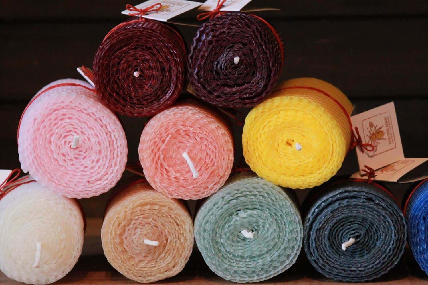 Rolled beeswax candles in assorted colours